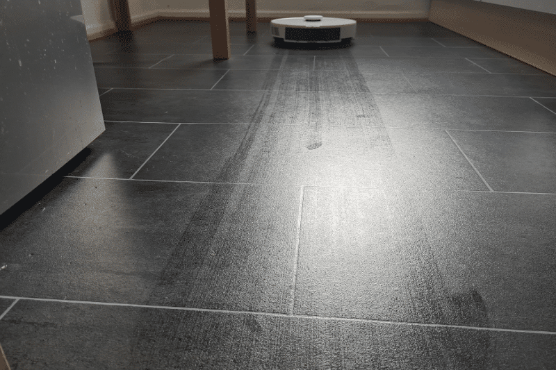 Roborock S7 Pro Ultra mops a PVC floor in the kitchen.